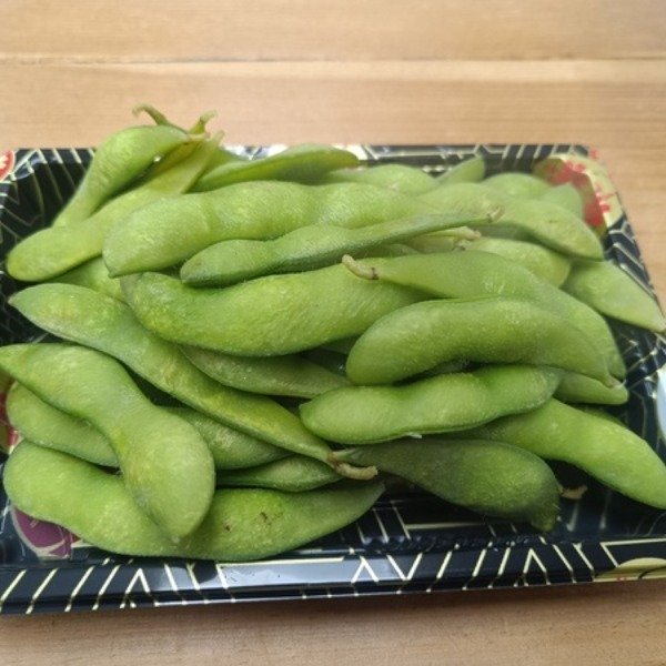 Enjoy a nutritious snack with salted edamame served in the pod.